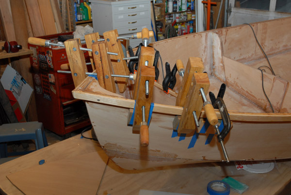 Lots of clamps are needed when laminating the gunwales.